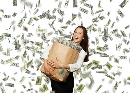 29781734 - happy and smiley businesswoman holding paper bag with money under dollar's rain